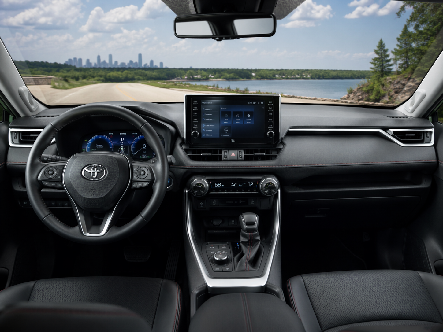 Toyota RAV4 interior with touchscreen, digital gauge cluster, and steering wheel